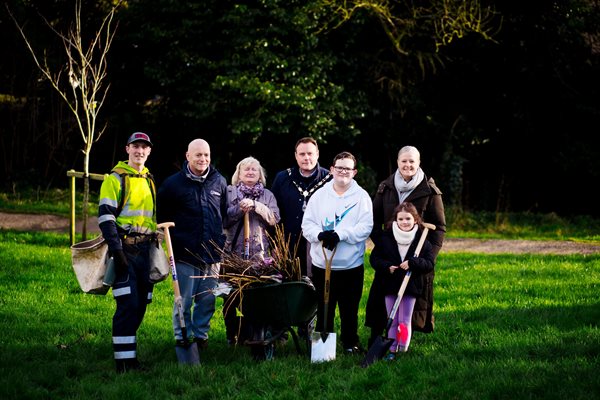 The-Mayor-of-Antrim-and-Newtownabbey,-Cllr-Mark-Cooper-joins-forces-with-over-30-local-residents-to-plant-trees-at-Whiteabbey-Glen.jpg