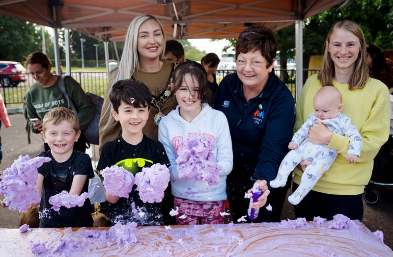 Deputy-Mayor-of-Antrim-and-Newtownabbey-Leah-Smyth-gets-messy-with-kids-at-the-sensory-play-sessions-at-Antrim-Loughshore.png